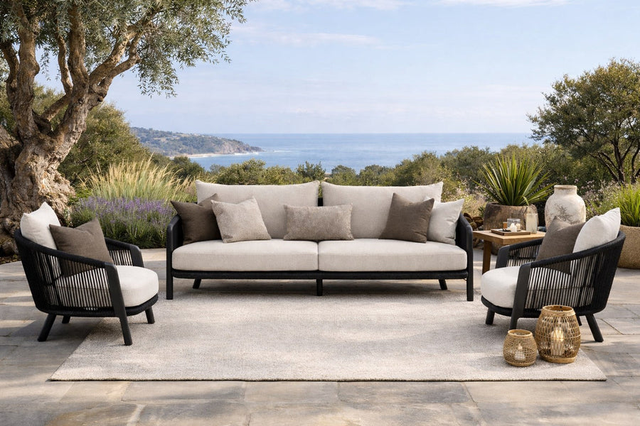 Haven outdoor sofa and lounge chairs on a terrace overlooking the sea, modern outdoor seating from SoBe Furniture, Boca Raton